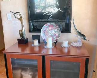 Framed posters, media cabinets