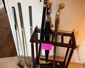 Vintage Ping putter, umbrella stand, canes and umbrellas