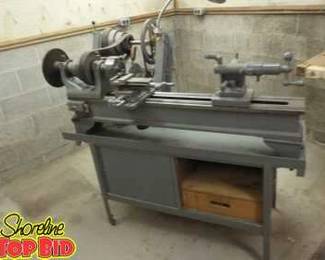 Heavy Duty Metal Lathe Converted to a Wood Lathe on Cabinet. Working, About 4foot Long