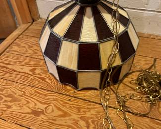 Stain glass lamps, Stain glass type lamps and several vintage lighting in this home.