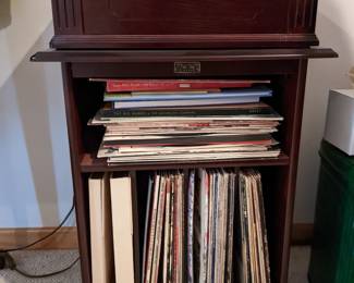 Record player and record stand. 
