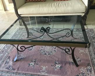Large glass top coffee table with metal base