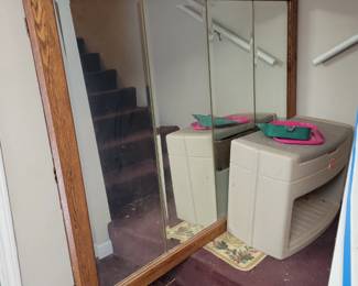 Large folding mirror.