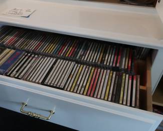lots and  lots  of  dvd"s  and  cd's 