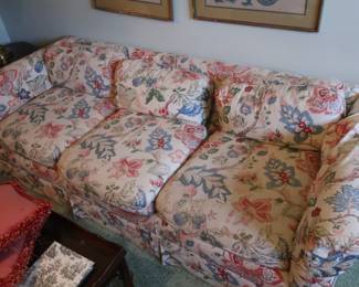 floral  sofa  with  three cushions