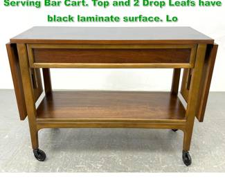 Lot 1312 LANE Walnut Drop Side Rolling Serving Bar Cart. Top and 2 Drop Leafs have black laminate surface. Lo