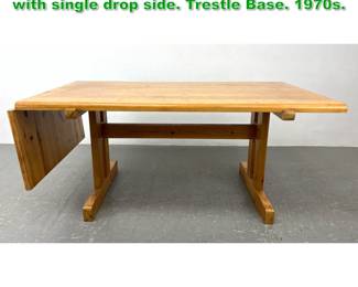 Lot 1520 Danish Pine Dining Room Table with single drop side. Trestle Base. 1970s.
