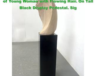 Lot 1348 AUSTIN PRODUCTS Modernist Bust of Young Woman with Flowing Hair. On Tall Black Display Pedestal. Sig