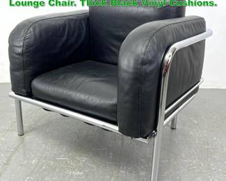 Lot 1382 Modernist Chrome Tube Frame Lounge Chair. Thick Black Vinyl Cushions. 