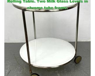 Lot 1556 double tier Round Modernist Rolling Table. Two Milk Glass Levels in chrome tube frame. 