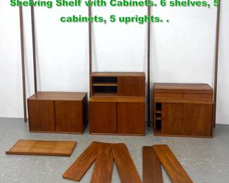 Lot 1196 CADO Style Modular Wall Unit Shelving Shelf with Cabinets. 6 shelves, 5 cabinets, 5 uprights. .