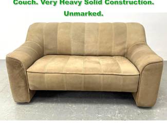 Lot 1297 De Sede Leather Settee Sofa Couch. Very Heavy Solid Construction. Unmarked.