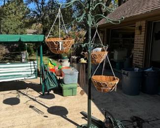 2 Cast Iron  Plant Outdoor Stand  12 Plant  hanging Arms. 6 straw metal  hanging baskets per  Stand ALL priced seperately