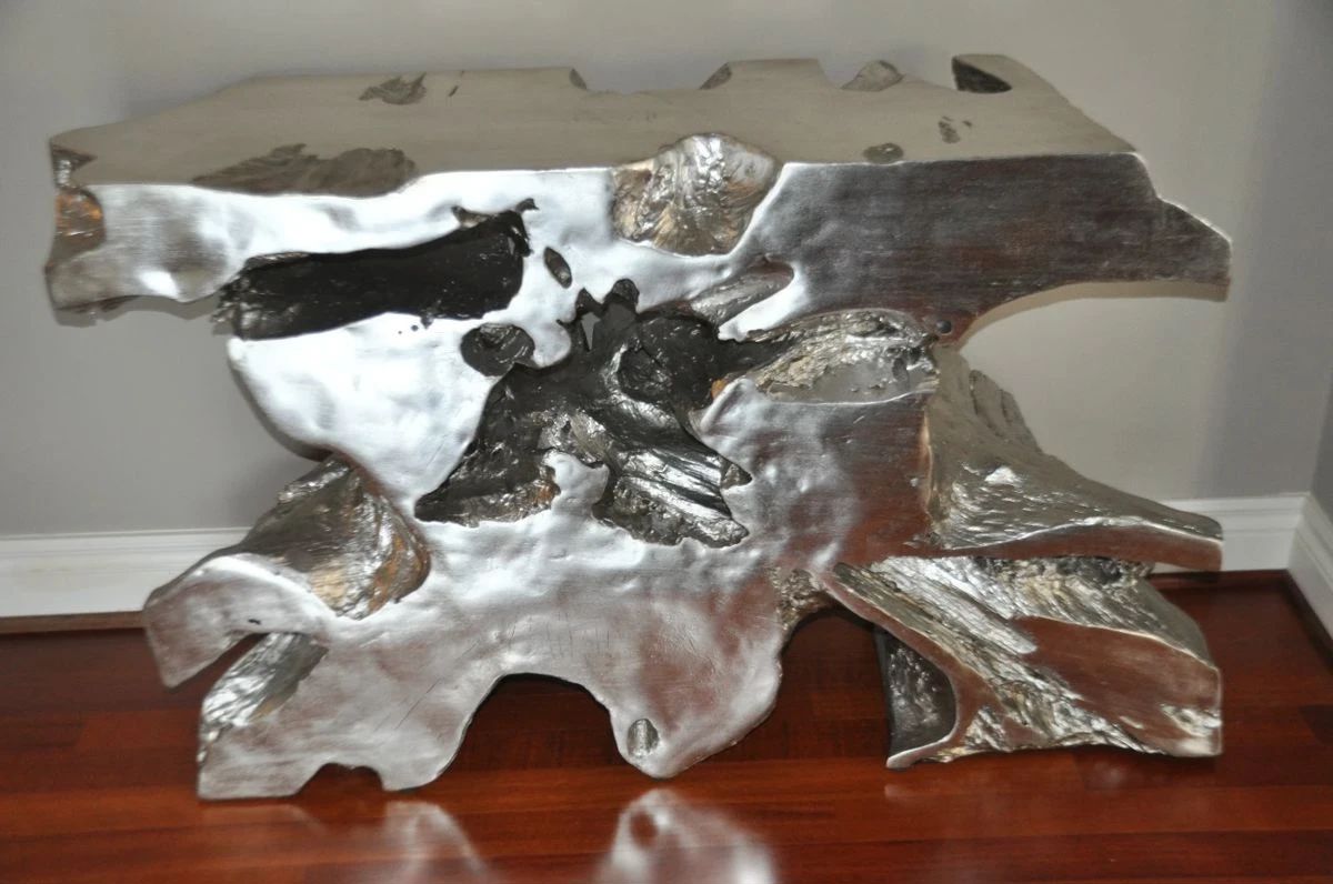 Up Close View of the Amazing Philips Collection Venice Free Form Console Table, Cast from a Single Wooden Tree Trunk with Silver Leafed. W48” x H30” x D13” List Price $2999  (Our Price $895)