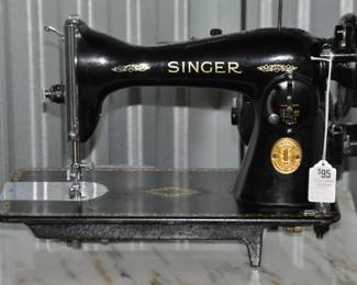 Vintage Singer Sewing Machine that is Classic and in Working Condition, Serial No. JC23151G, ($95).