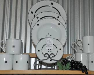 This Stunning Swid Powell China Makes Such a Statement!  Available is a 3 Piece Place Setting Including Dinner Plates, and Rimmed Soup Bowls, Service for 8 in the "Tuxedo Black" Pattern. As Is ($695). Also Shown are a Set of 8 Tuxedo Black Tall Coffee Mugs, Sold Separately 
