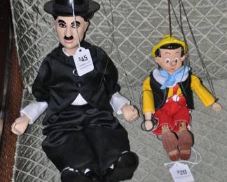 Vintage Charlie Chaplin Marionette ($45)  Sitting Beside a Vintage Pinocchio Marionette. ($20-SOLD)
