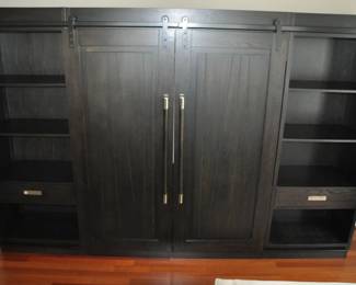 Phenomenal Liberty Furniture “Abbey Collection” Industrial Style Entertainment Center with Piers and Barn Door, Made in USA. Overall Dimension: 10’ W x 79”H x 18”D Retail $8500 ($2795)