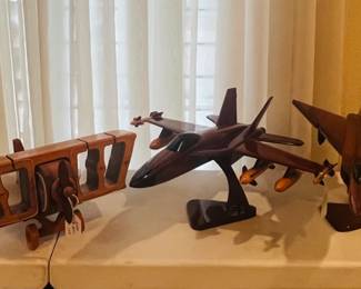 Vintage cast iron and wood model airplanes