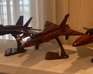 Vintage cast iron and wood model airplanes