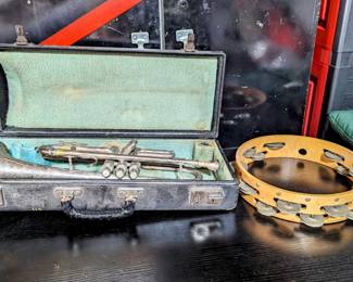 Trumpet, tambourine and antique violin