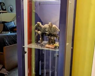 Curio cabinet with a light