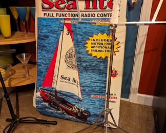 Sea Lite model boat, music stand and guitar stands