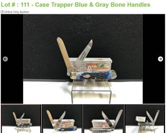 Lot # : 111 - Case Trapper Blue & Gray Bone Handles
2013 W. R. Case & Sons Shepherd Hills Exclusive - Civil War Series - Border Knife Measures: 4" closed Blades: 2, one blade etched Confederate States of America other side of blade etched United States of America Badge: 2, one oval American Flag long tail CASE xx other side oval Confederate flag long tail CASE xx Bolsters: blue side engraved U.S. Confederate side C.S.A. Box: original.
