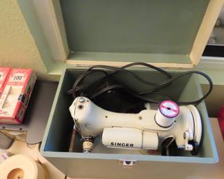 Antique Singer sewing machine (white).