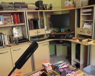 Dell moniter and speakers, books, stationery supplies.