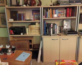 Bookcases, books, slide projector, carousels,.