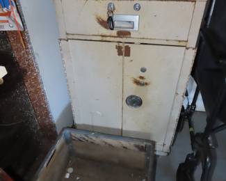 Metal storage cabinet, old wood crate.