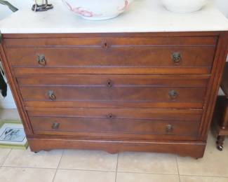 Marble top antique linen chest.
