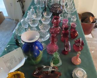 Cranberry glass, Italian art glass. Waterford stemware.