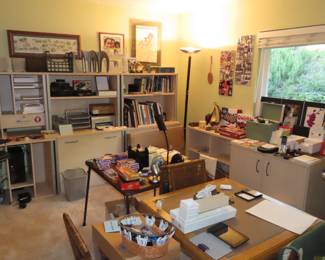Office, games table with four folding chairs, bookcases, shelves and storage cabinet.