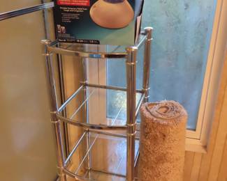 Glass and chrome like shelves. Vicks steamer.