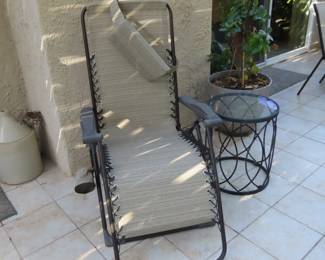 Sun lounger, end table.