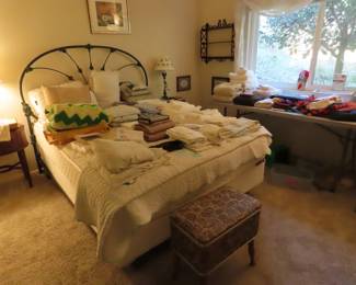 Bedroom area, linens, towels, blankets.