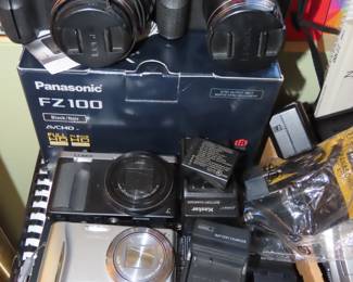 Amazing camera collection including Lumix, Panasonic, and Canon digital cameras.