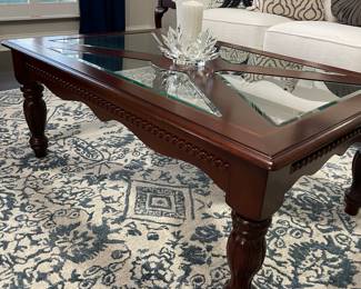 Oversized wood and glass coffee table