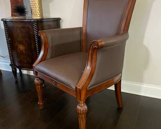 A pair of leather side chair