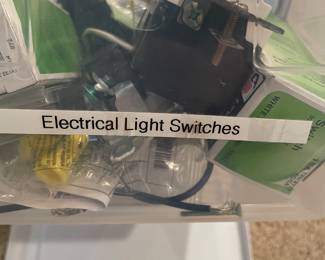 Box of electrical light switches > see next photo >