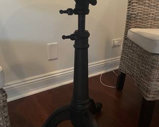 Additional view of adjustable base on round metal table ~