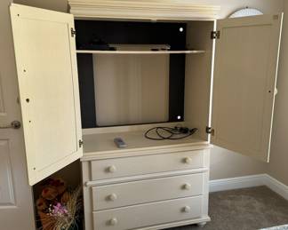 29	$200 	
Cream armoire 40Wx69Hx23D 3 drawers & doors 	