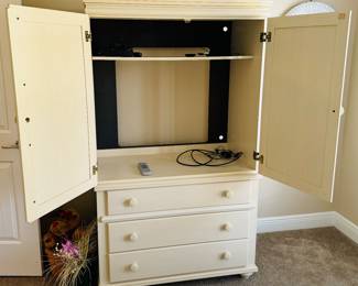 29	$200 	
Cream armoire 40Wx69Hx23D 3 drawers & doors 	