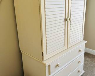 29	$200 	
Cream armoire 40Wx69Hx23D 3 drawers & doors 	