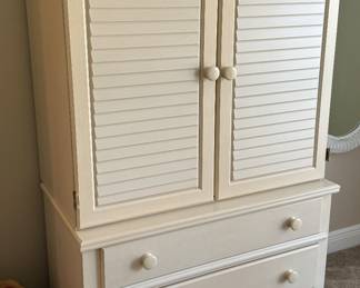 29	$200 	
Cream armoire 40Wx69Hx23D 3 drawers & doors 	