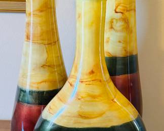 43	$80 	
et of 3 vases glass tallest 25H tall		