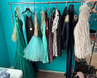 Costumes on Rack including Security Costumes, (Fur Coat is pictured elsewhere and is not part of costumes)