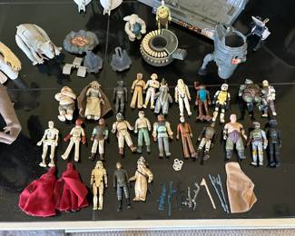 Collection of Star Wars vehicles, sets, and figurines